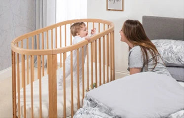 Lit Bébé Ovale Oasis Boori – Multifonctionnel 3 en 1, Bois Massif, Roulettes, 0-12 Ans